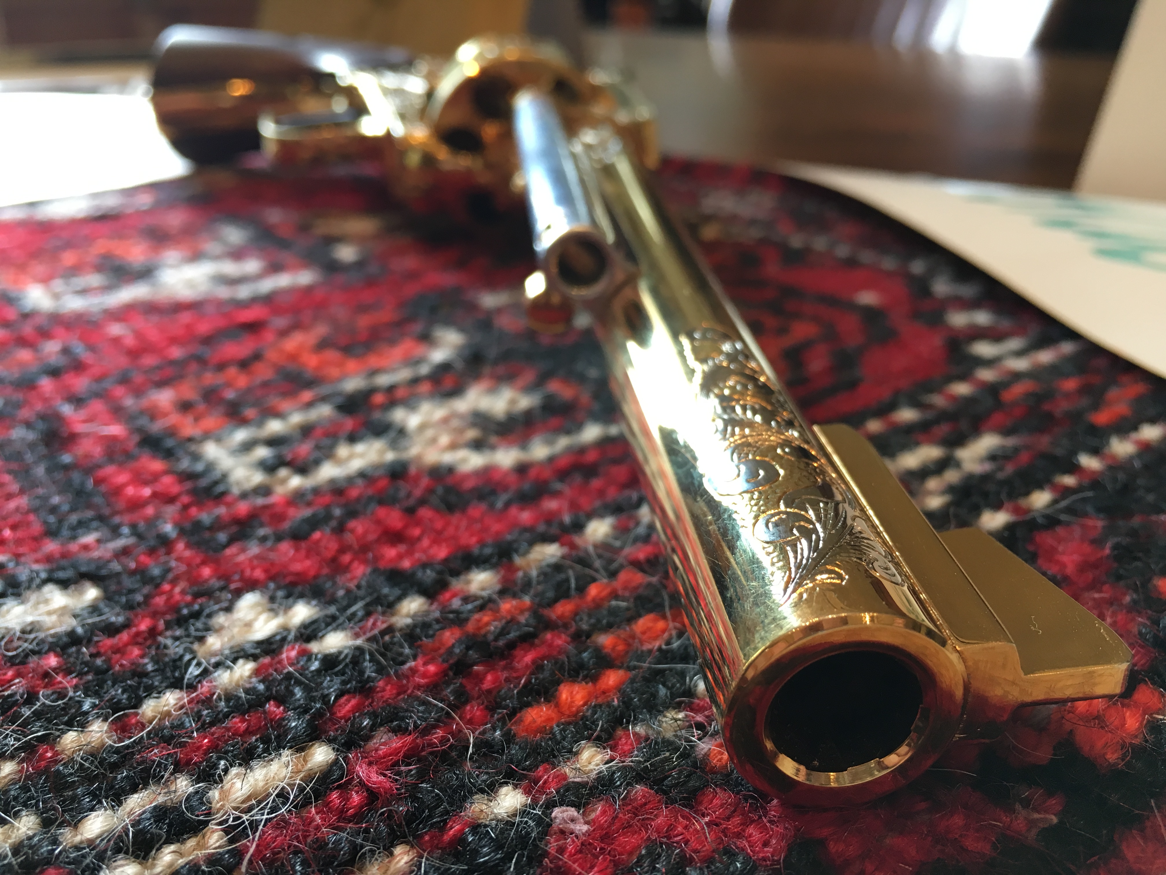The stolen gold-plated .44 Magnum is now back where it belongs.